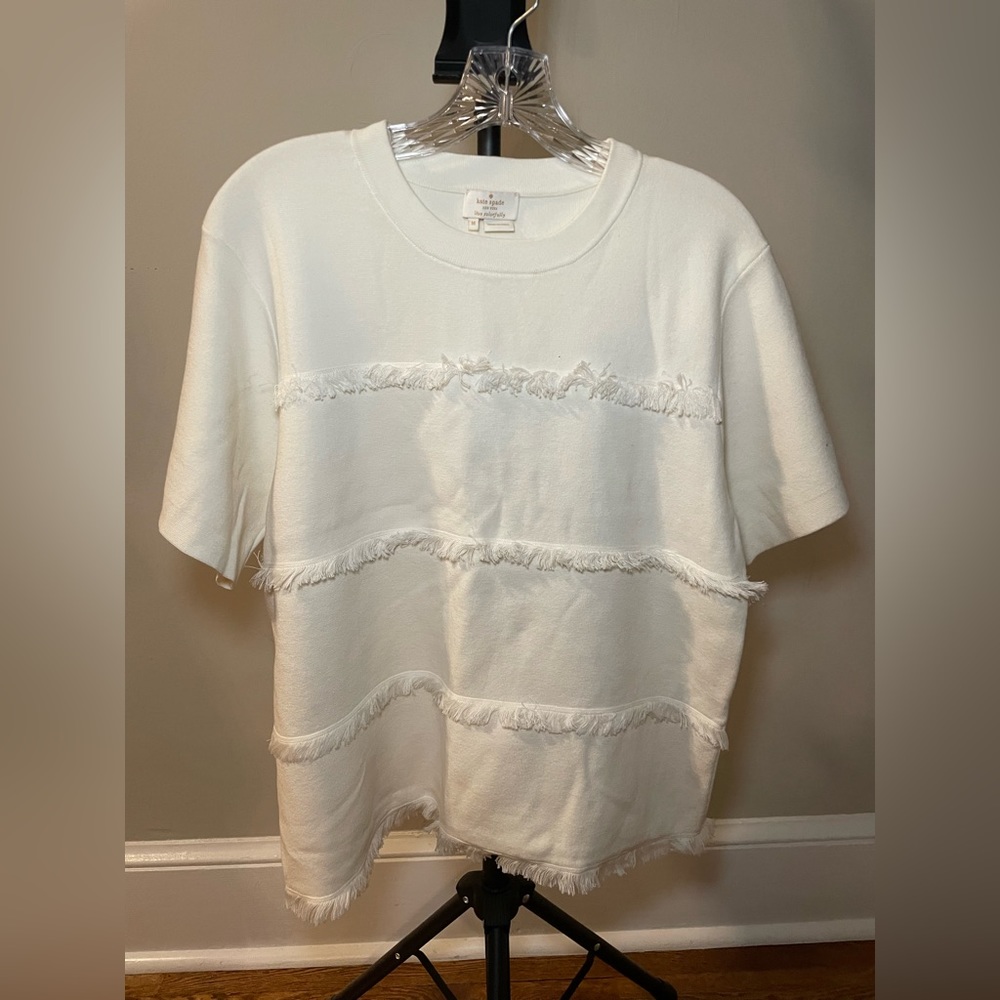 Kate Spade white fringe tiered sweater top.